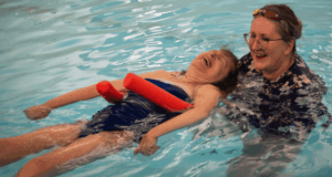 volunteer help swimming