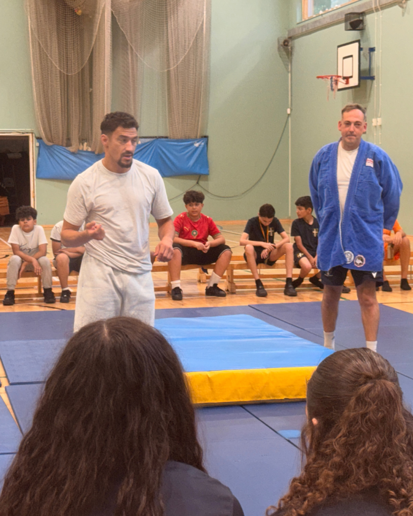 Ashley Mckenzie & St Augustine's Deputy head doing a judo demo