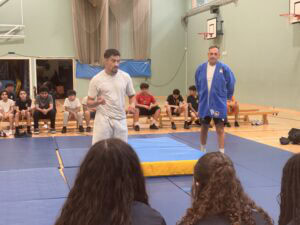 Ashley Mckenzie and Deputy Head at St Augustine's doing a judo demo