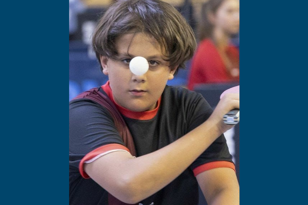 Teagan playing table tennis