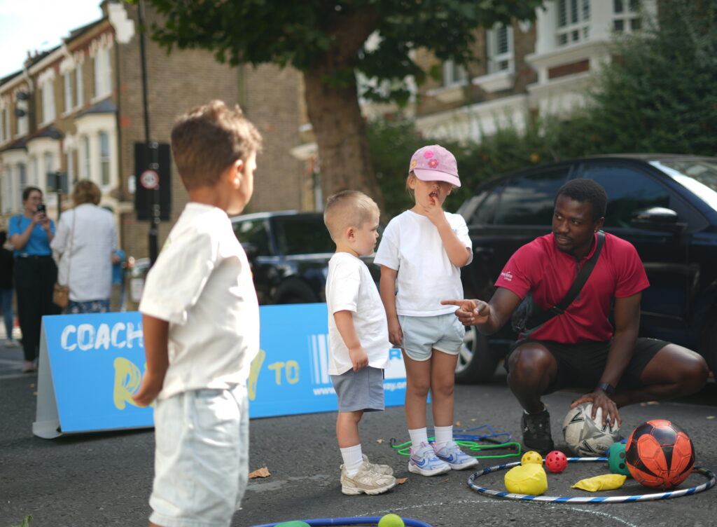 Ashmore Rd Play Day Play Street - Children interacting with EA Staff