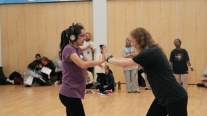 Dance Westminster 2025 - Heat 1 - College Park School - Young Disabled People. Young participant practicing their routine with their dance partner