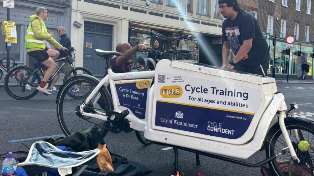 Cycle Connects staff at London Cycle Festival - Sunday Streets at Church Street as part of World Car Free Day